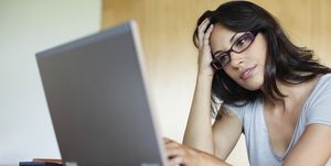 frustrated woman using laptop