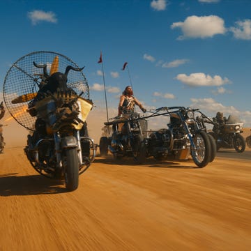 furiosa movie a group of motorcycles on a desert road