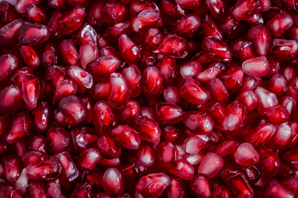 Full frame shot of fresh, red pomegranate seeds