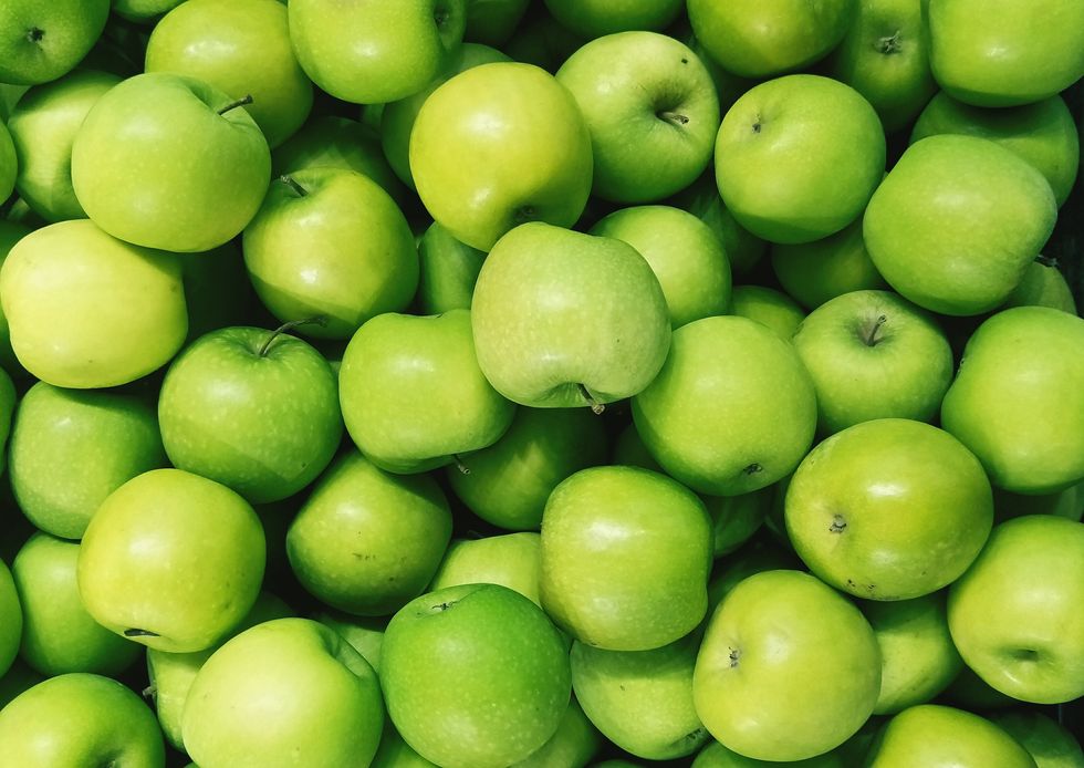 full frame shot of granny smith apples for sale in market