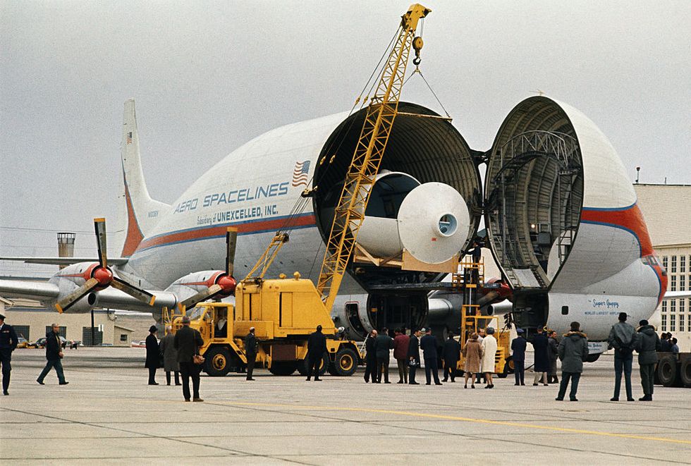 Workmen Unloading Cargo from a 'Super Guppy' Plane