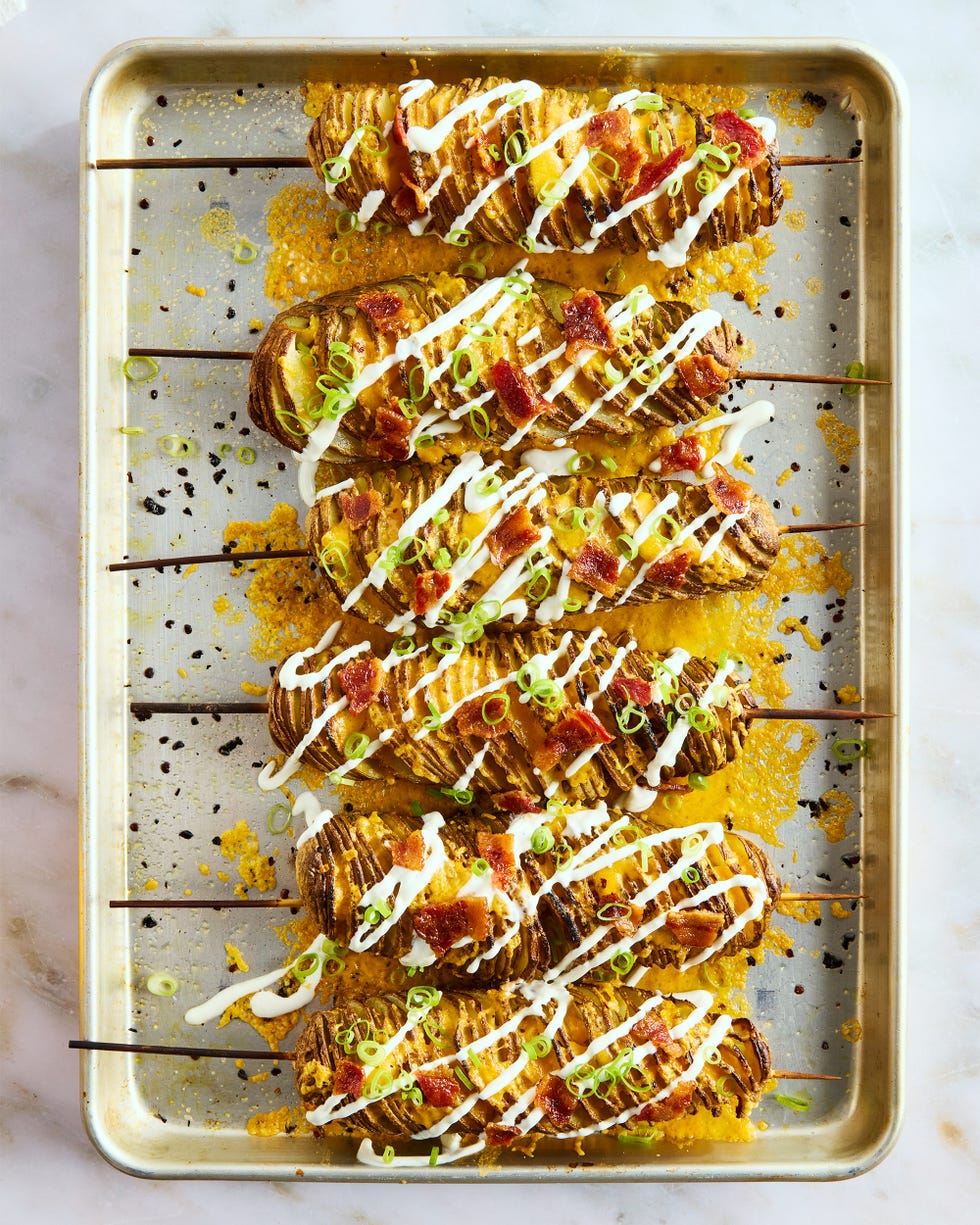 fully loaded tornado potato with sour cream scallions cheddar cheese and gochugaru