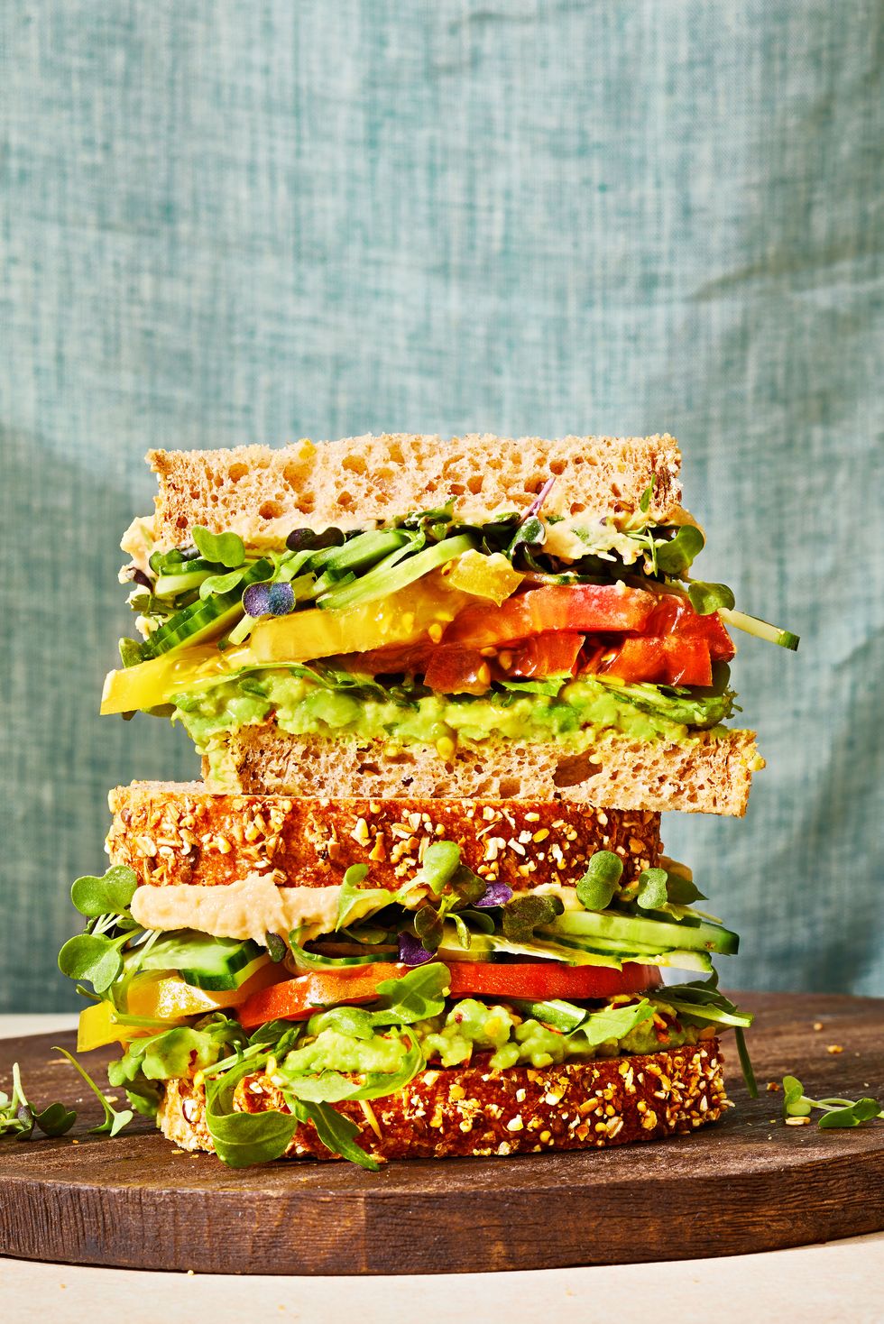 https://hips.hearstapps.com/hmg-prod/images/fully-loaded-veggie-sandwiches-6552a30fa4974.jpg?crop=0.827xw:0.826xh;0.0688xw,0.0903xh&resize=980:*