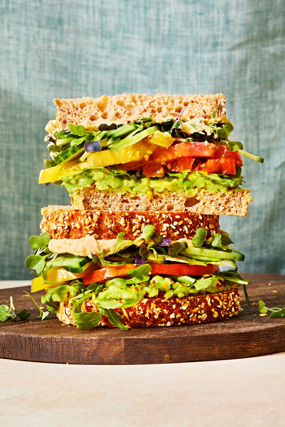 vegetable sandwich with avocado, tomato, cucumber and greens