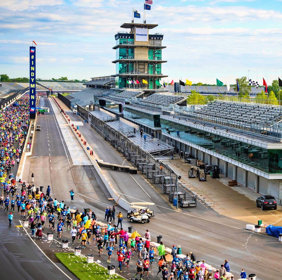 runners in the 500 festival mini marathon take a lap around the indianapolis motor speedway