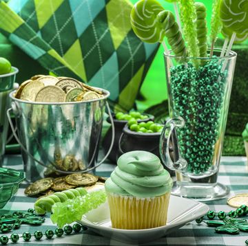 bright and colorful green photograph of st patricks day party favors and food