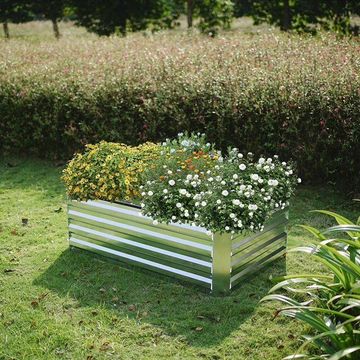 a bench with flowers in it