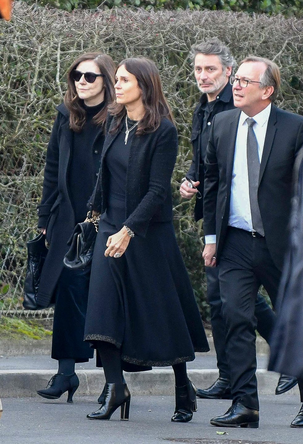 Fashion, Overcoat, Outerwear, Coat, Street fashion, Footwear, Bodyguard, Eyewear, Trench coat, Gesture, 