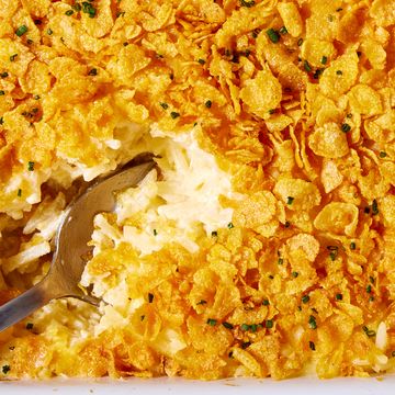 creamy cheesy potatoes with a buttery cornflake topping