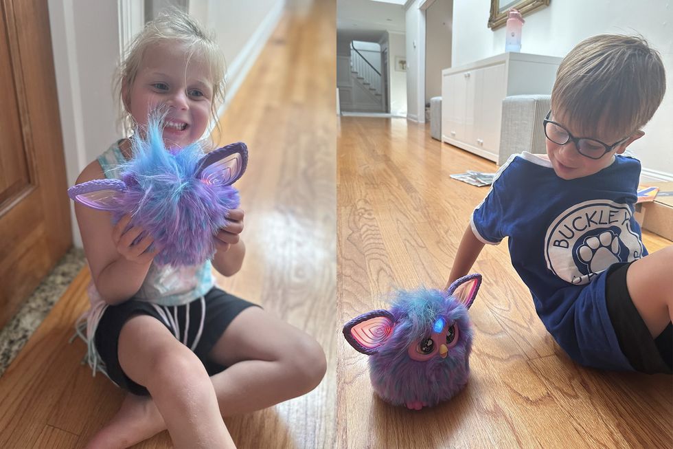 kids playing with purple furby
