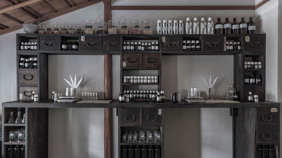 a room with shelves of bottles