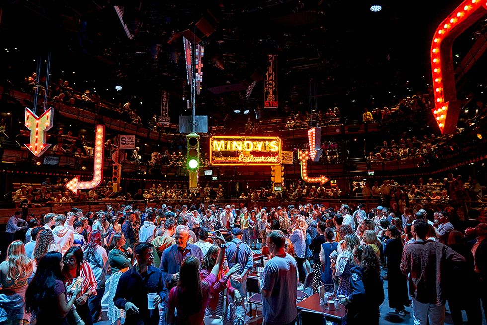 the audience at guys and dolls at the bridge theatre london