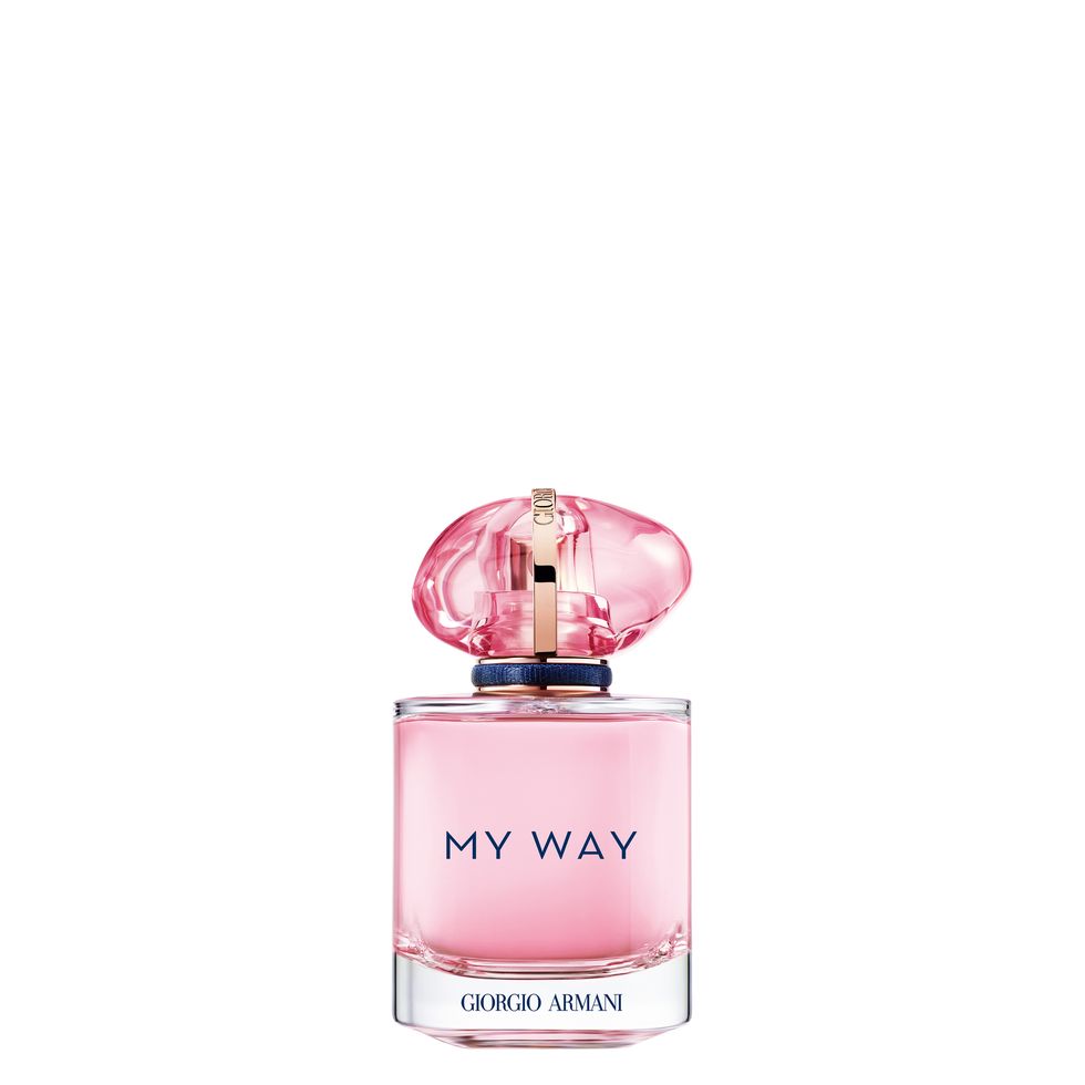 a pink and white perfume bottle
