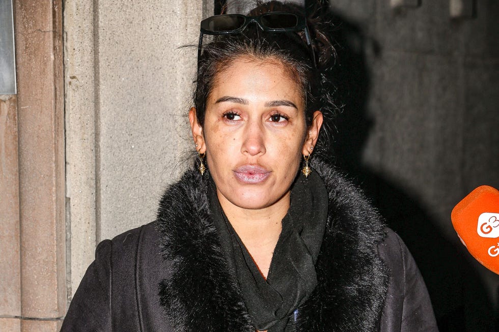 a person with a black coat