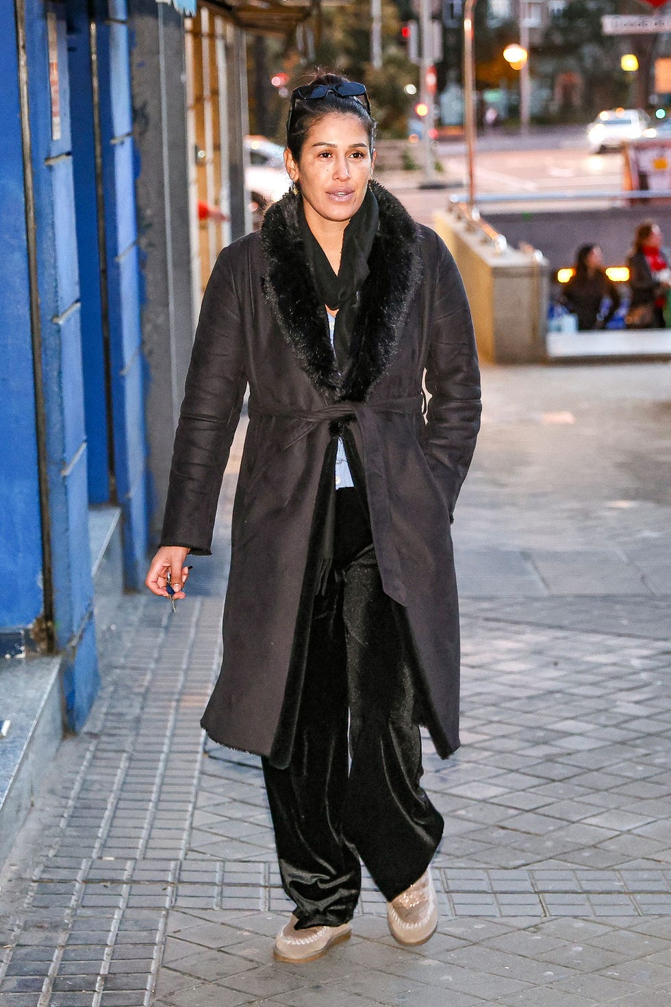 a person wearing a black robe
