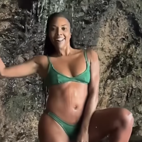 Gabrielle Union Poses in a Green Bikini Under a Maui Waterfall