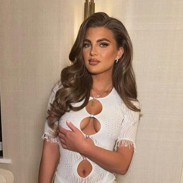 Love island rumoured cast a person wearing a stylish white dress and holding a handbag