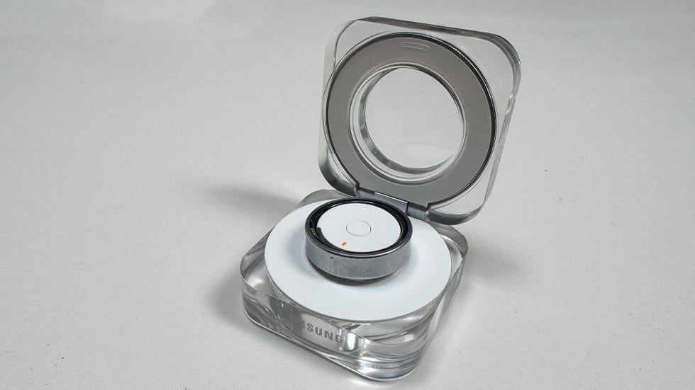 a smart ring charging in a dock