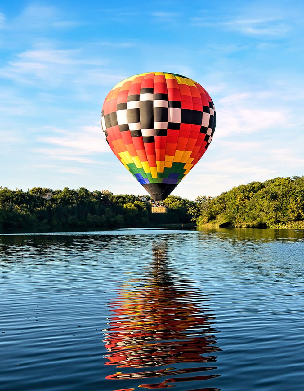 hot air balloon over a lake