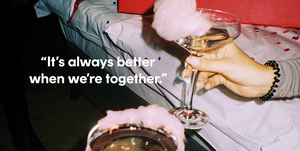 women hold champagne glasses with cotton candy rims