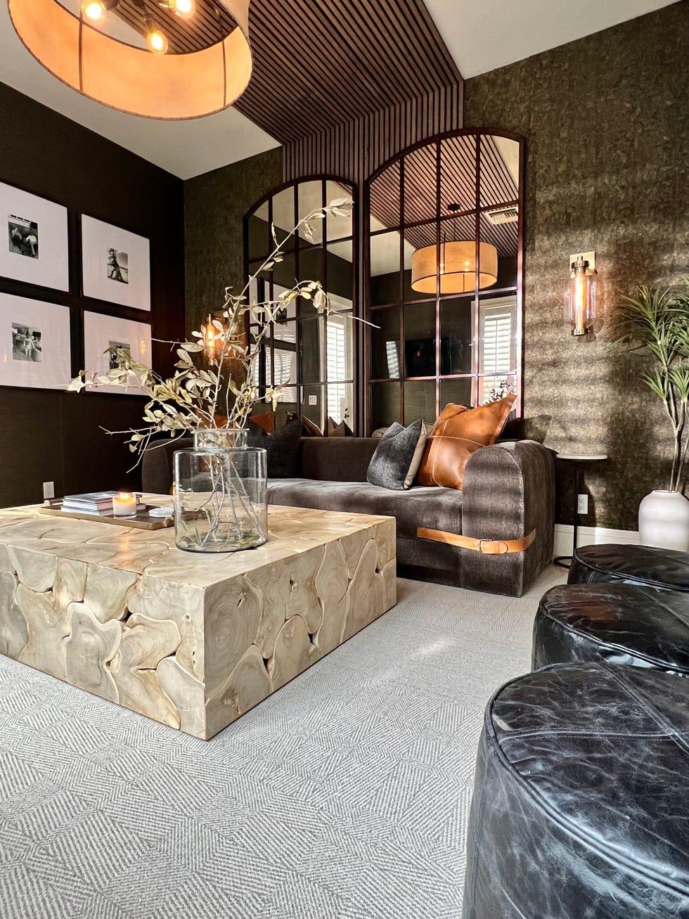 stylish living room featuring a textured wooden coffee table and a dark sofa