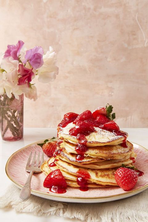 strawberry pancakes with fresh strawberries on top