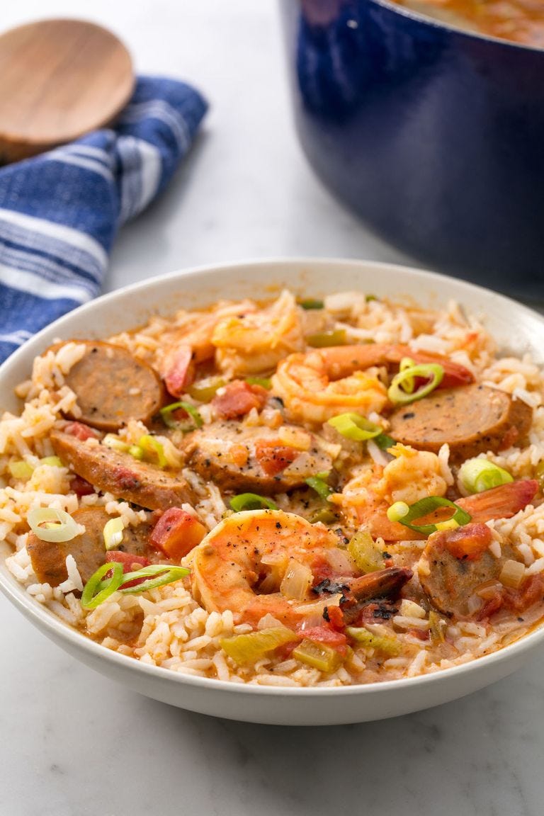 gumbo with sausage, shrimp and rice in a white bowl