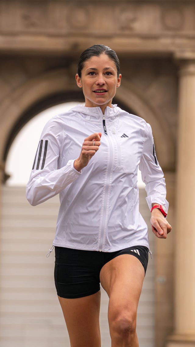 person running in athletic apparel
