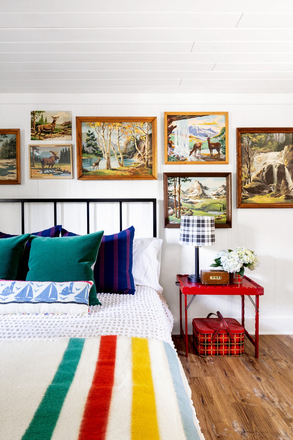 bedroom with paint by numbers art on the wall