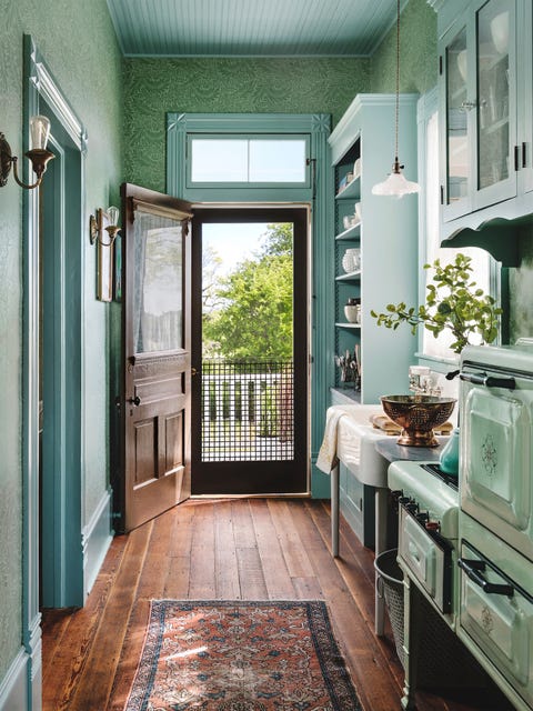 farmhouse galley kitchen with wallpaper