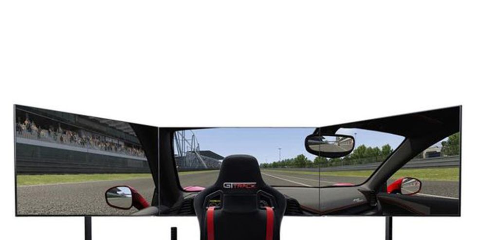 sim racing rig with triple screen monitor