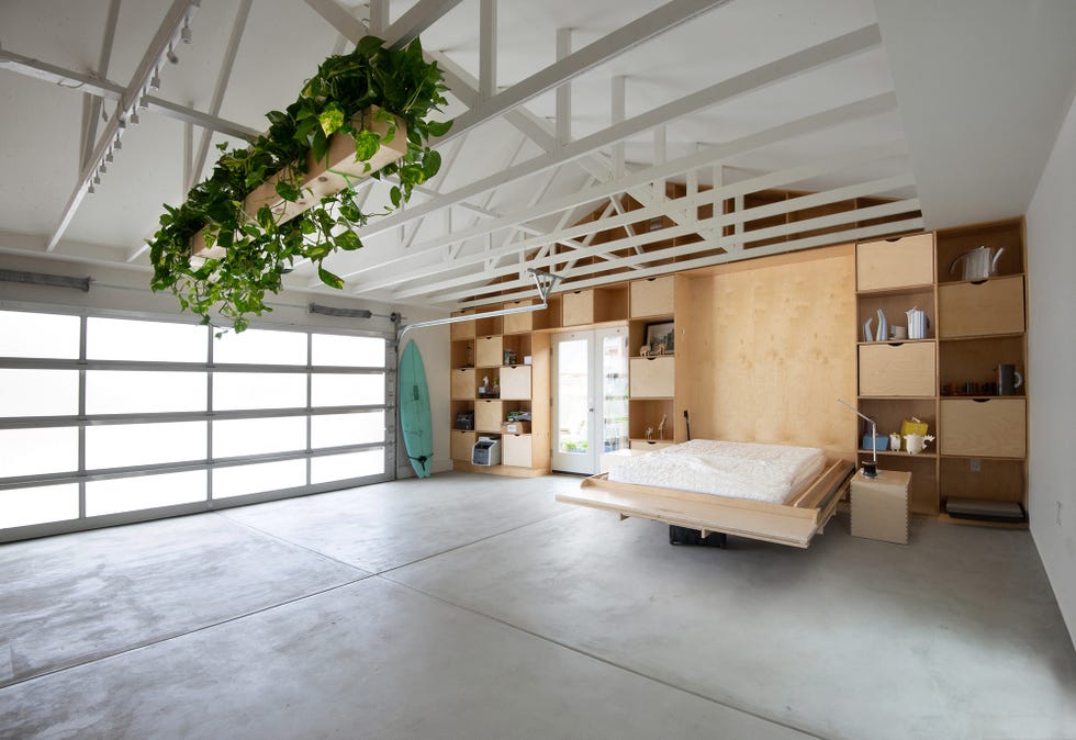 dormitorio con cama abatible