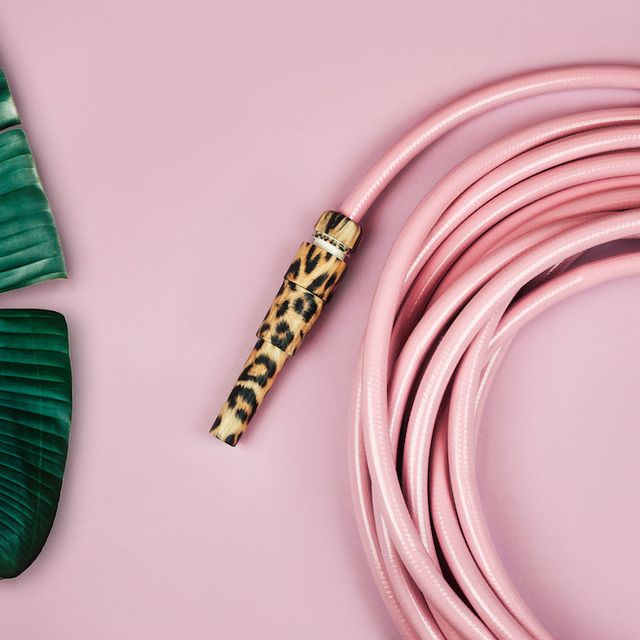 pink garden hose with a leopard print nozzle