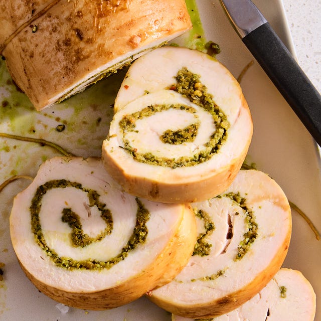 swirls of garlic and herb inside sliced turkey