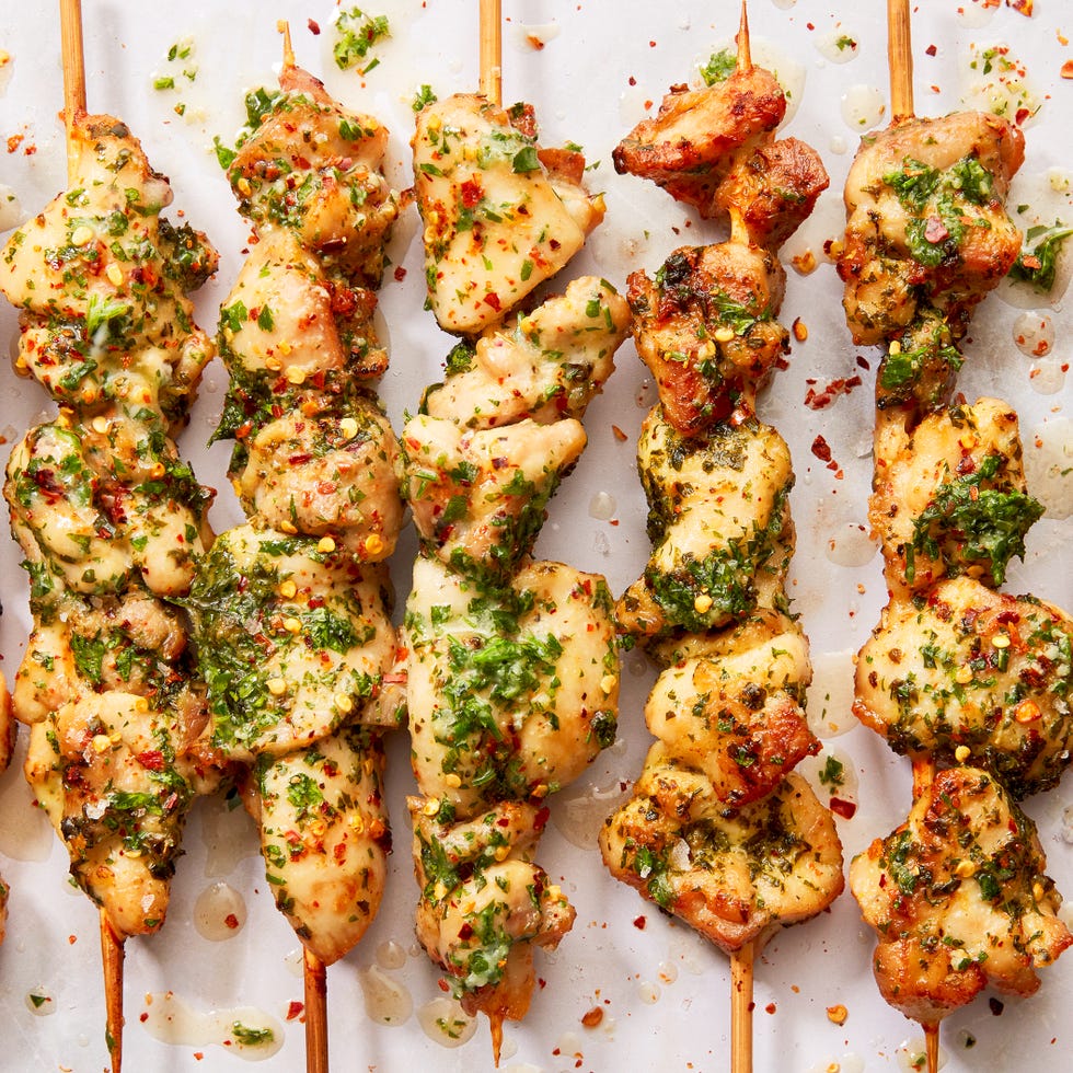 chicken skewers in a garlic herby sauce