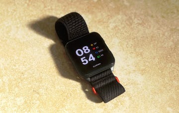 a black smartwatch with a square colourful display screen