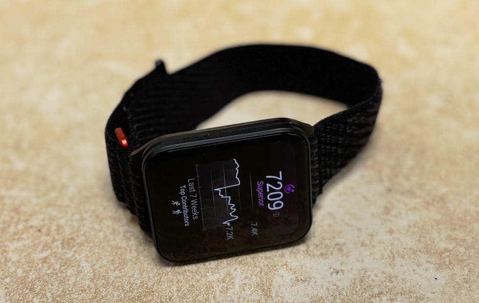 A black smartwatch on the page