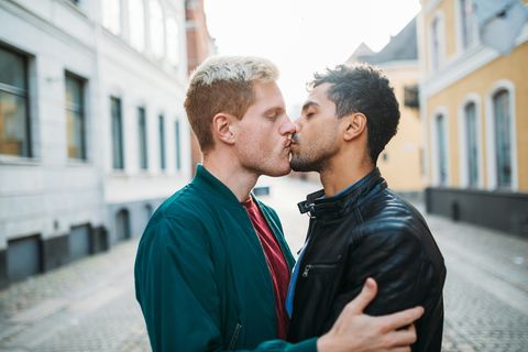 gay couple on city break on romantic honeymoon  latino and scandinavian gay men enjoying their common life together