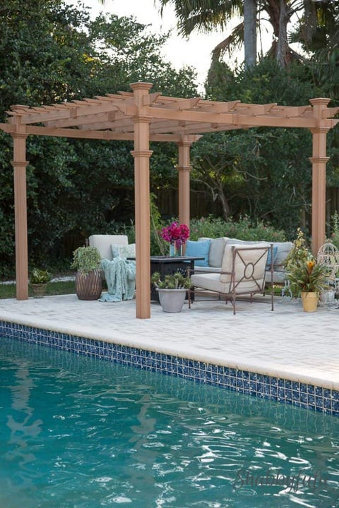 pergola next to a swimming pool