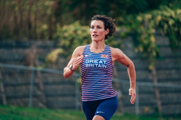 an athlete in motion on a track