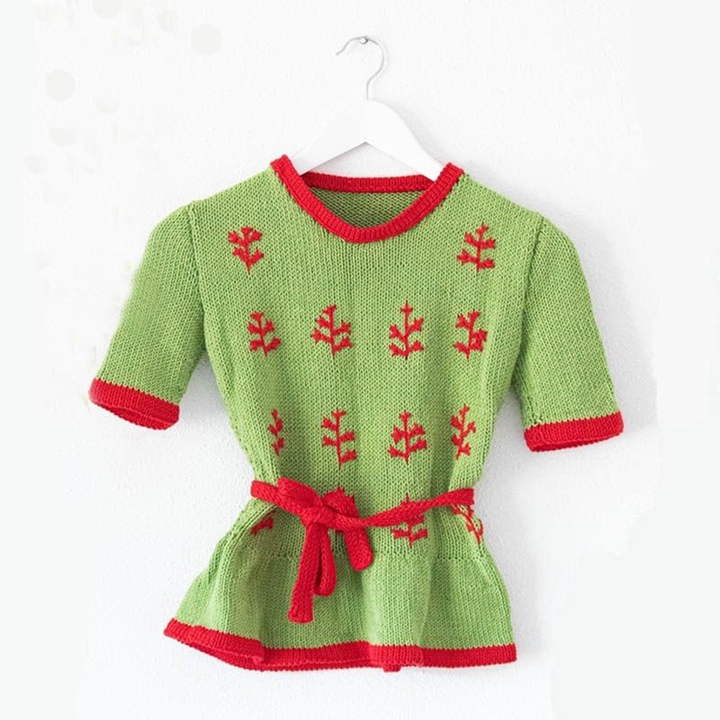 green peplum blouse with red embroidery and tie