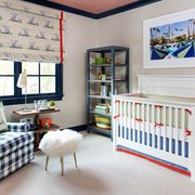 gender neutral nursery with blue and red color scheme