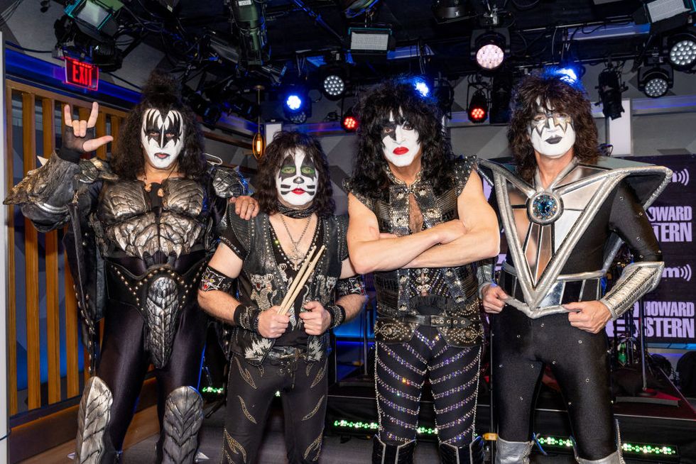kiss members pose for a picture at siriusxm