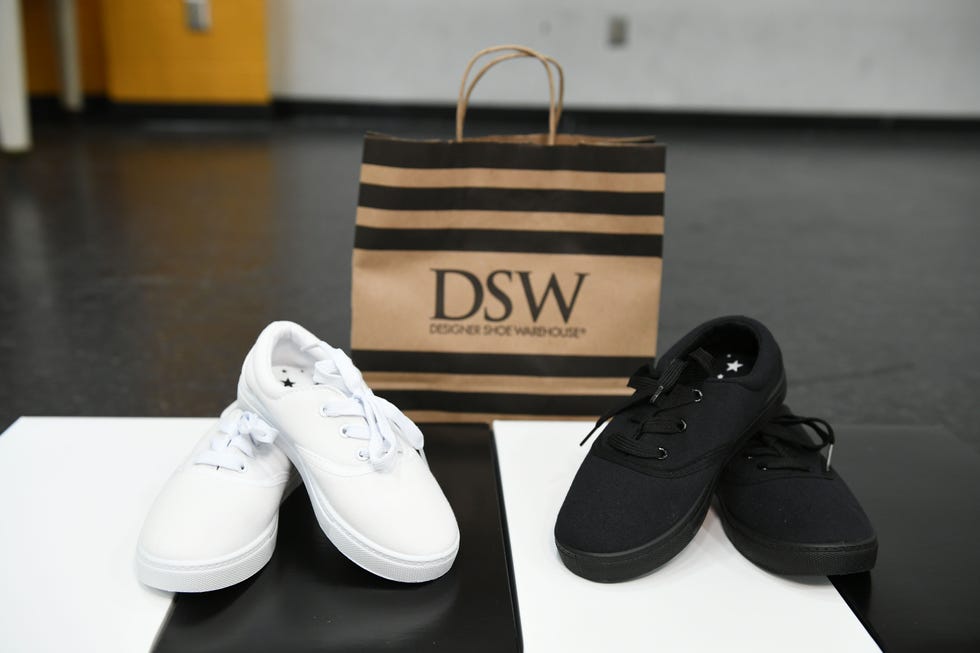 former nfl star victor cruz kicks off dsw's shoe donation summer campaign