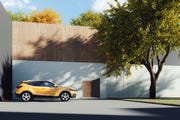 car and house after using a home equity loan to buy a new car