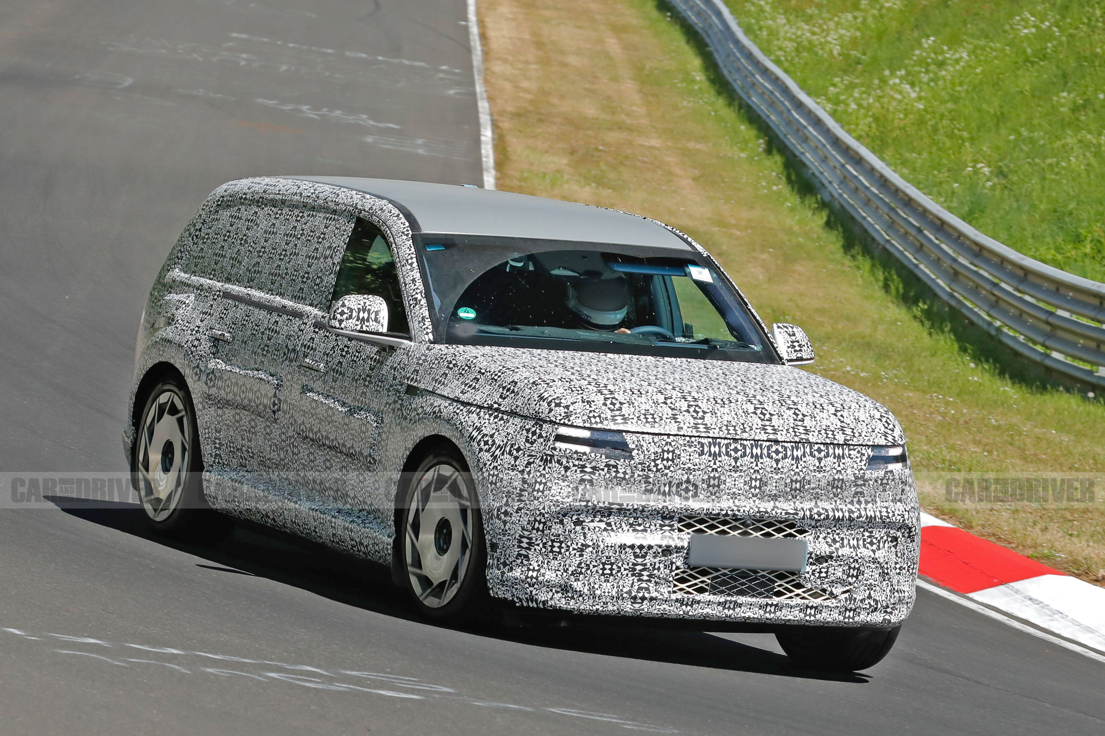 image of "2026 Genesis GV90 Electric Flagship SUV Looks Massive in Spy Photos"