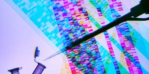 Genetic research, pipette and DNA samples on DNA autoradiogram illustrating research into life sciences and genetic modification