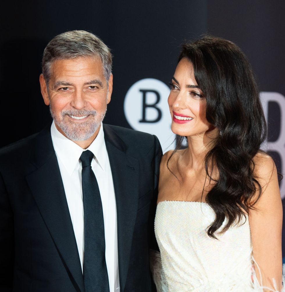 london, england   october 10 george clooney and amal clooney attend the tender bar premiere during the 65th bfi london film festival at the royal festival hall on october 10, 2021 in london, england photo by samir husseinwireimage