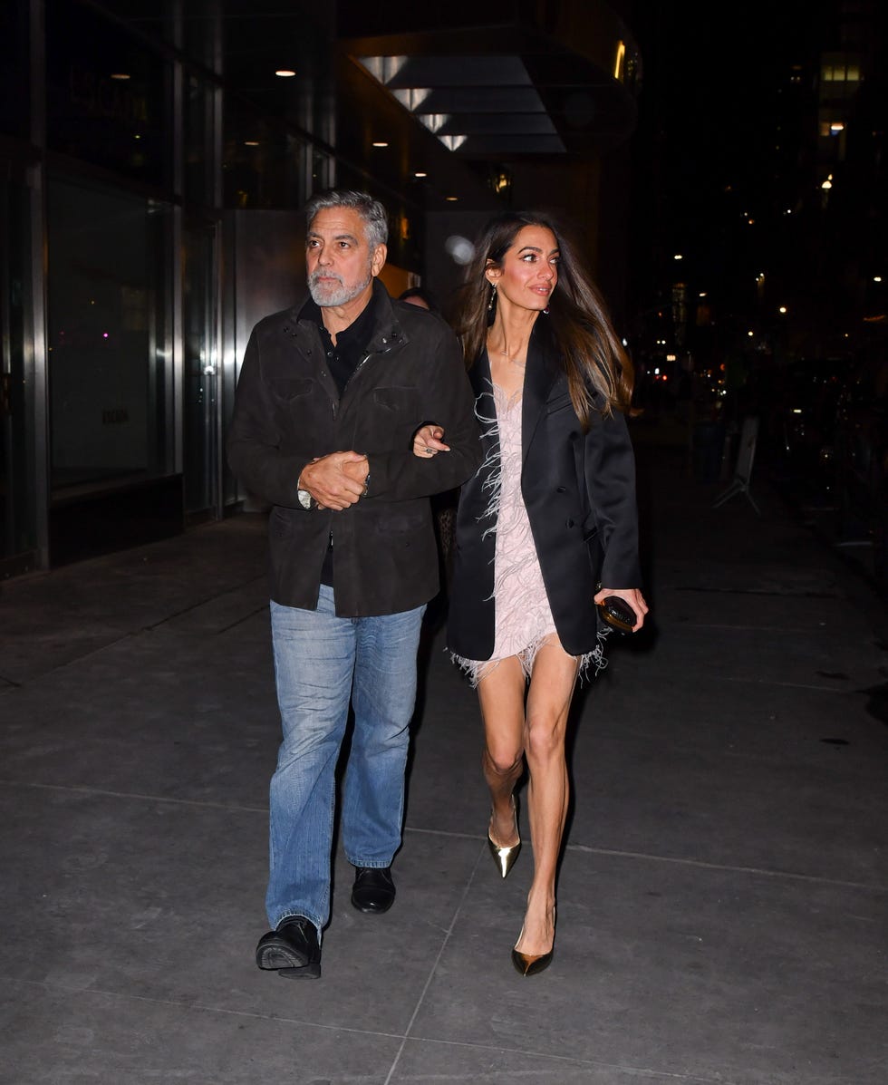 george and amal clooney in new york city on december 13, 2023