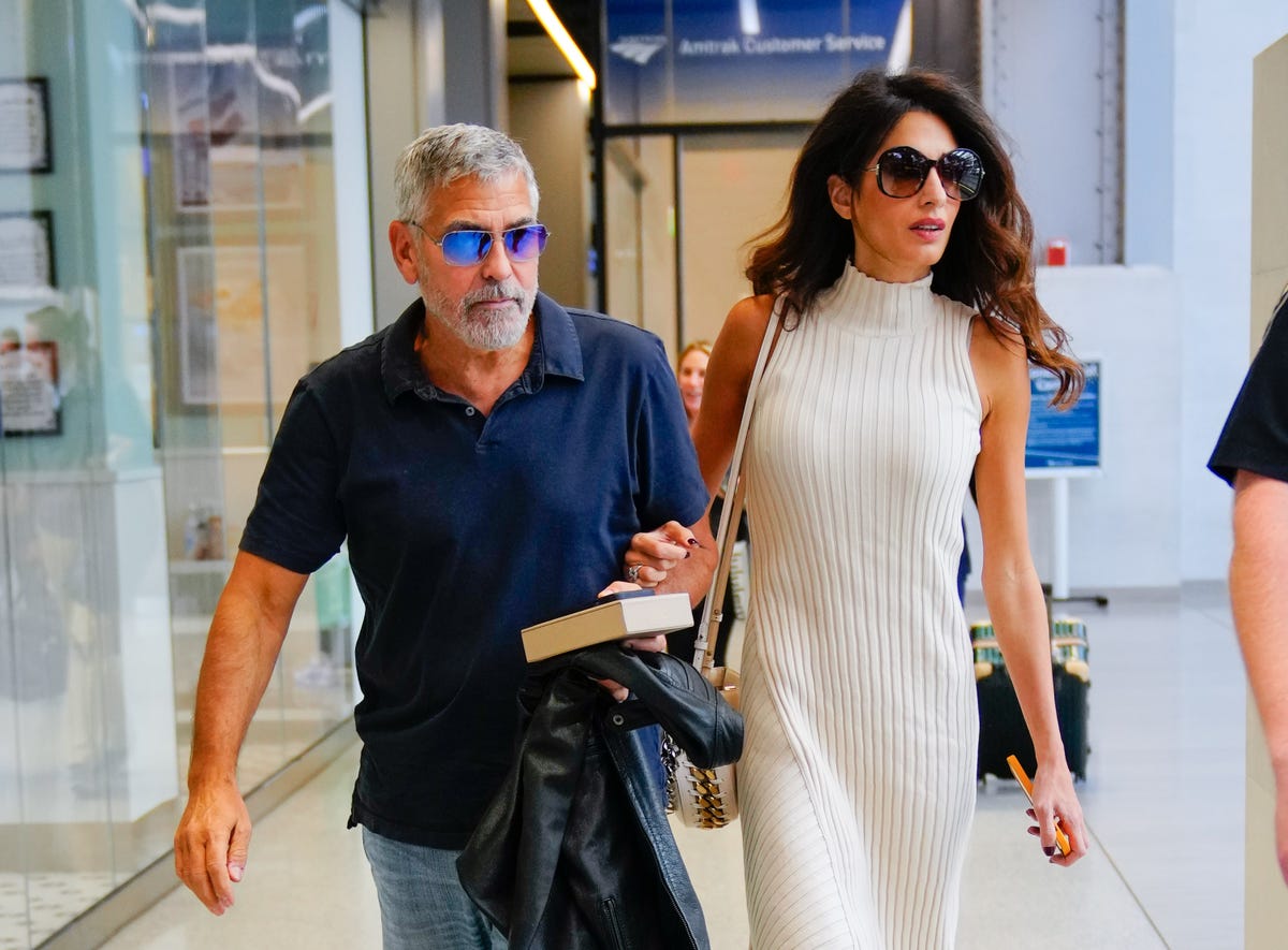 Amal Clooney Wore Classic Sneakers With a Chic Spring Dress